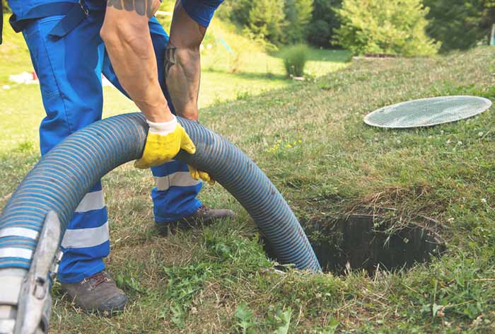 Septic cleaning with hose - Buddys Septic